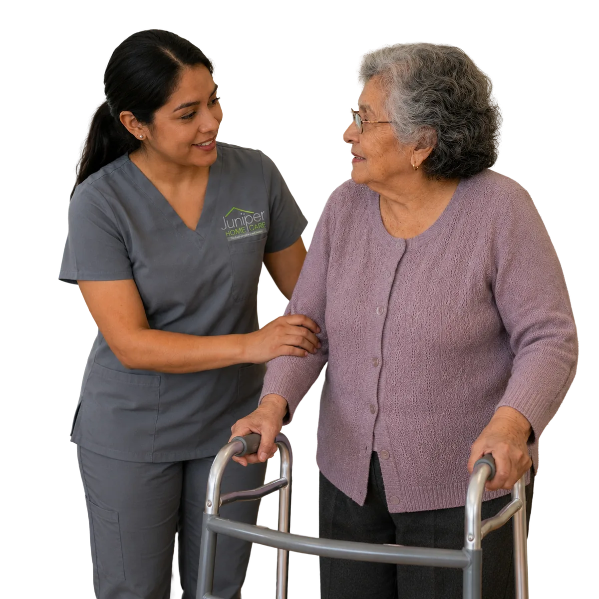 A Juniper Home Care nurse supporting a client using a wheelchair at home